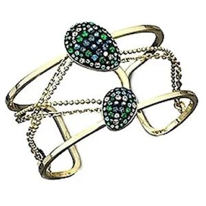 Swarovski bracelet SWAN SIGNED BORN
BLUE GREEN CUFF in gold tone setting